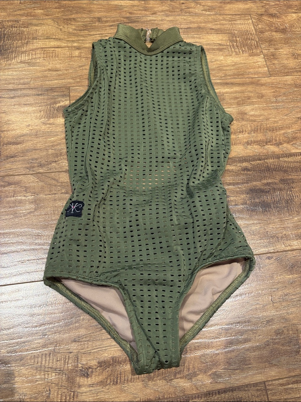 Kandi Kouture leotard olive green mesh material with a high neckline.